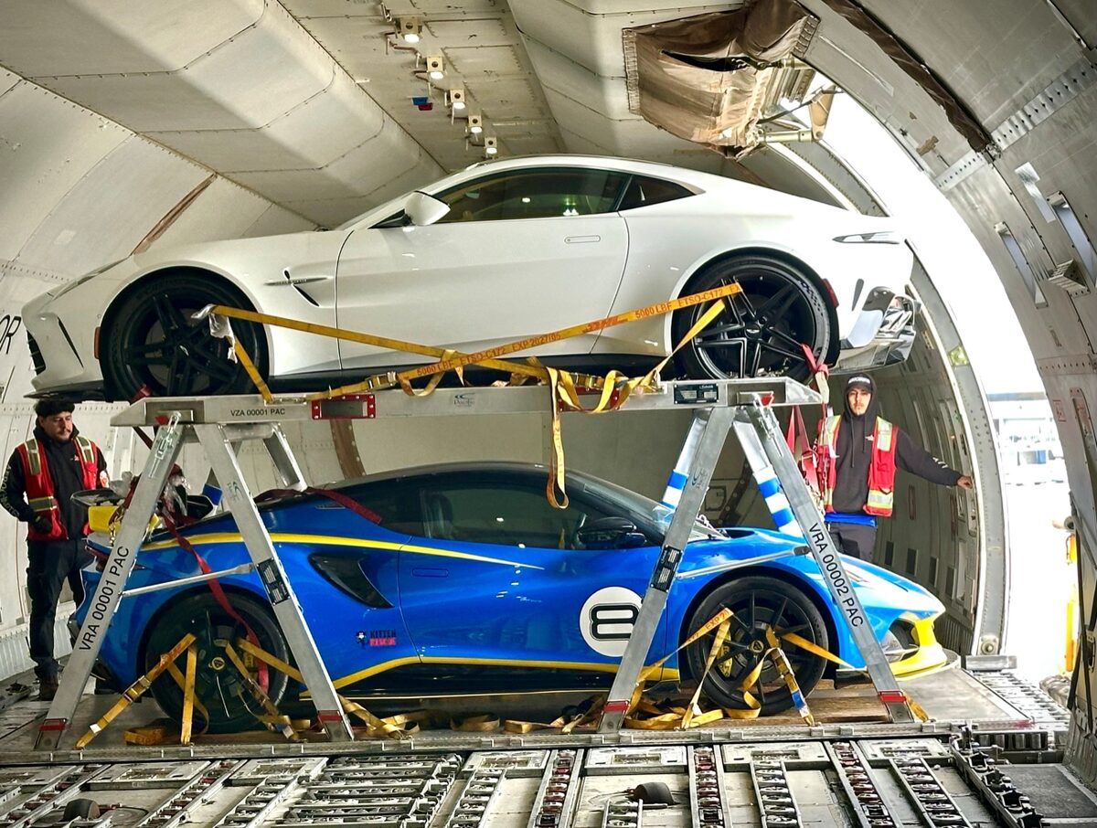 Cars secured aboard an air cargo freighter for vehicle shipping between Los Angeles and Honolulu